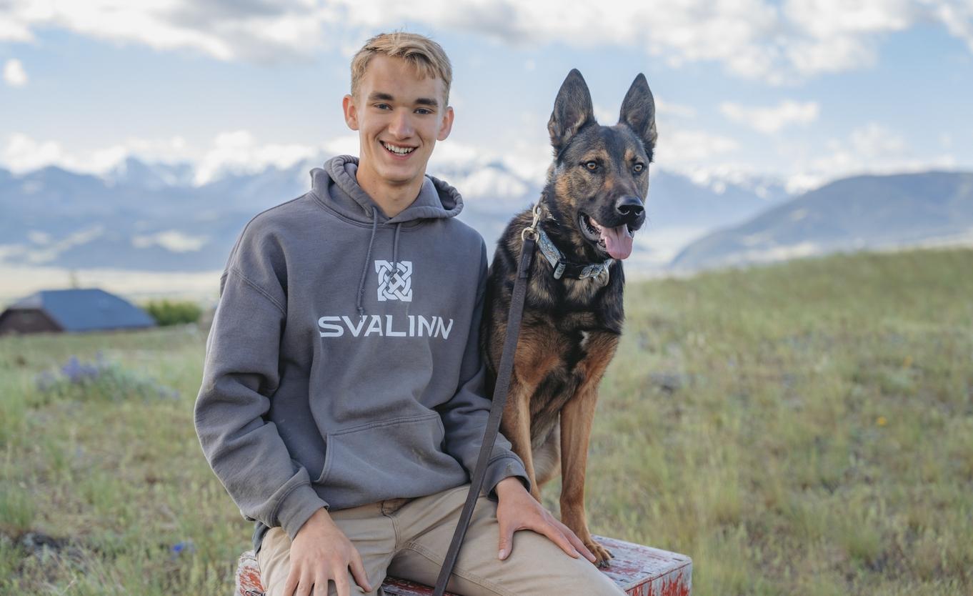 Shane outside with mountains